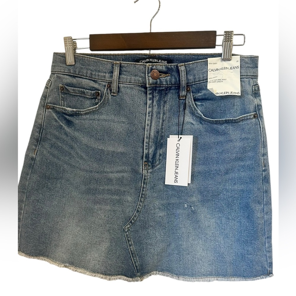 Calvin Klein Jeans Light Wash Denim Mini Skirt Raw Hem Size 28 NWT Y2K